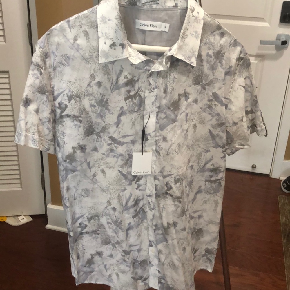 Calvin Kline button down short sleeve shirt.